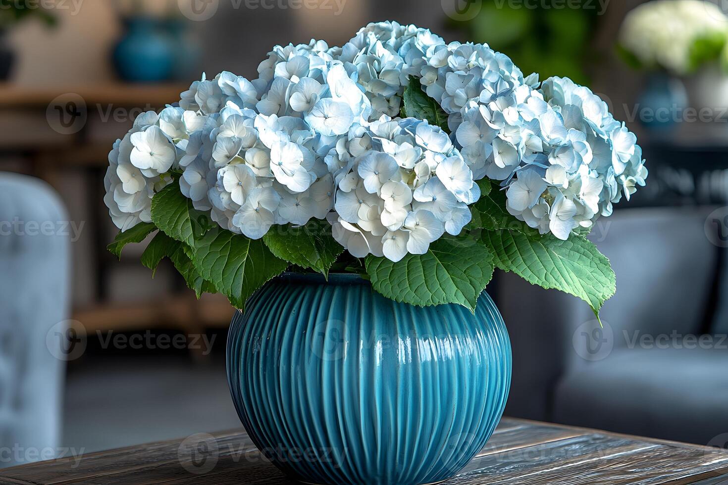 Elegant Blue Hydrangea Arrangement in Textured Vase for Home Decor and Floral Design photo