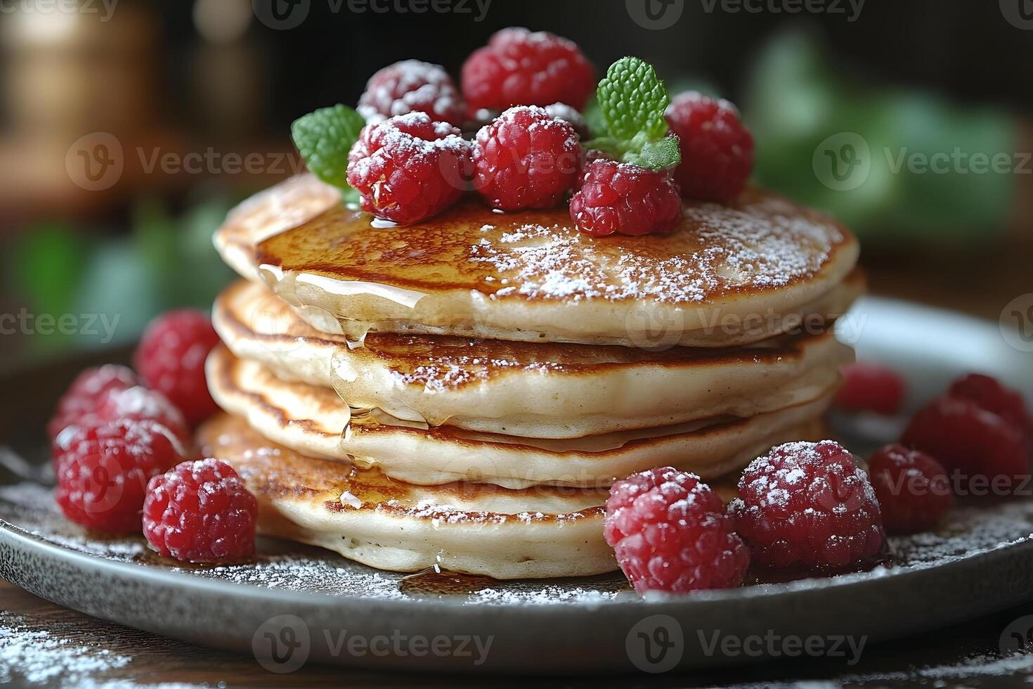 Delicious Stack of Pancakes with Fresh Raspberries and Syrup Perfect for Breakfast or Brunch photo