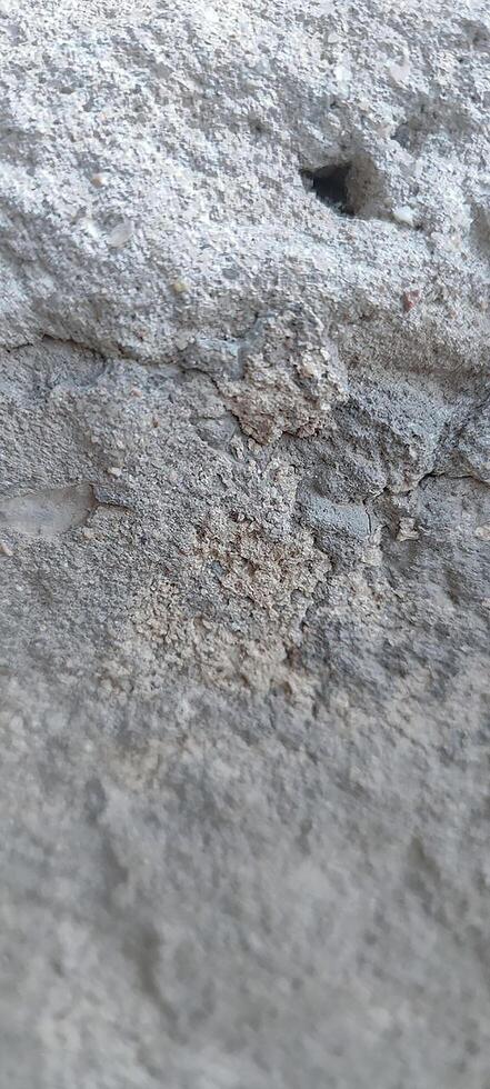 Rough Cement Wall with Tiny Holes photo