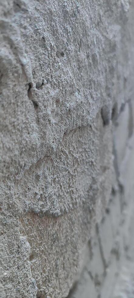 Raw Concrete Surface with Visible Pebbles photo
