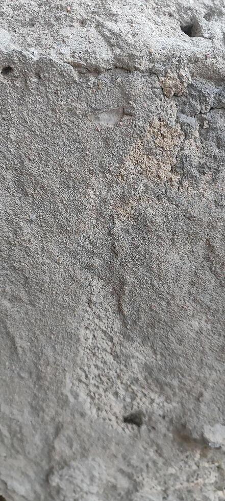 Detailed View of Weathered Cement Wall photo