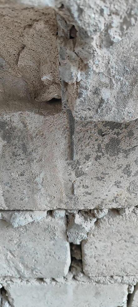 Cracked and Uneven Cement Texture Details photo