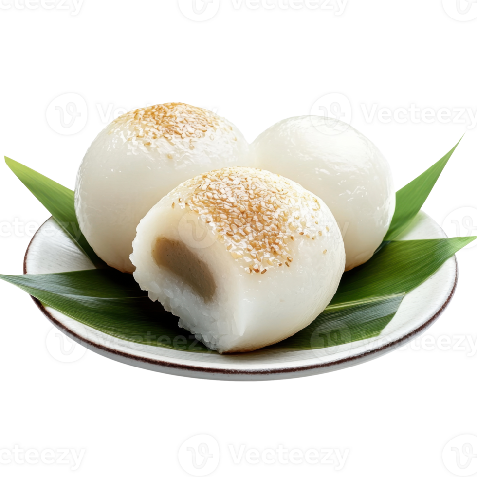 Soft, round dumplings topped with sesame seeds, presented on a plate with leaves, showcasing their delicate texture and smooth surface. png