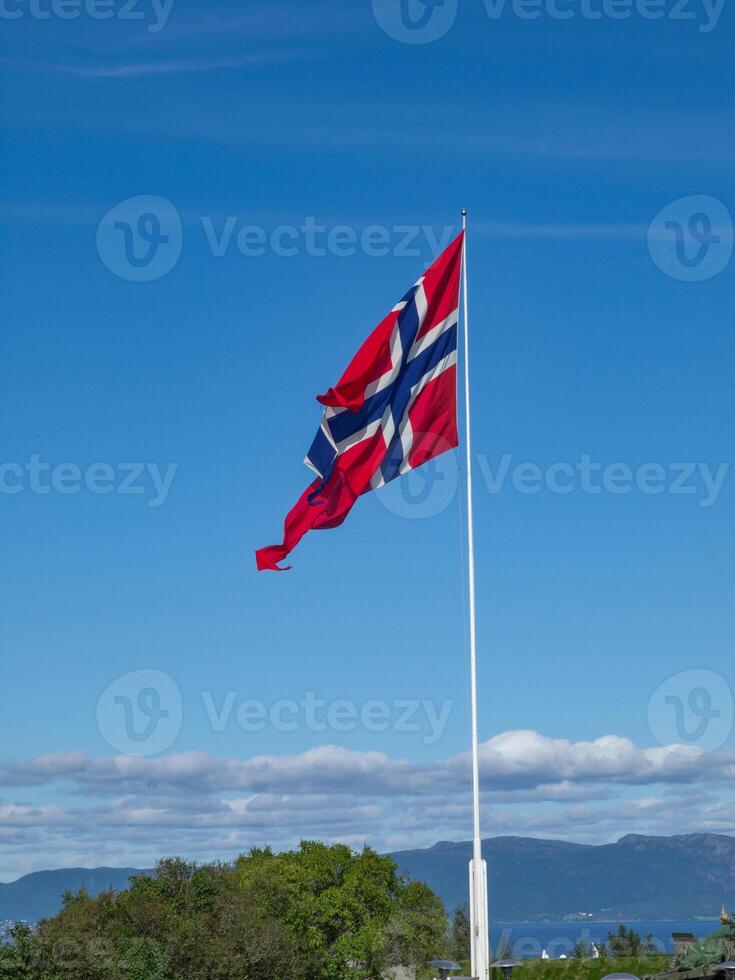 A blue sky with white clouds and a banner photo
