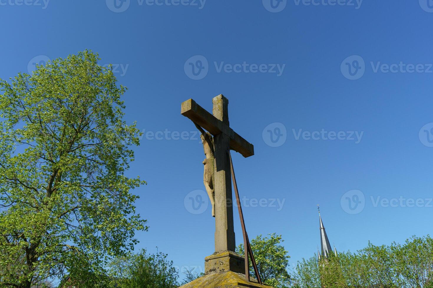 A cross on a pole photo