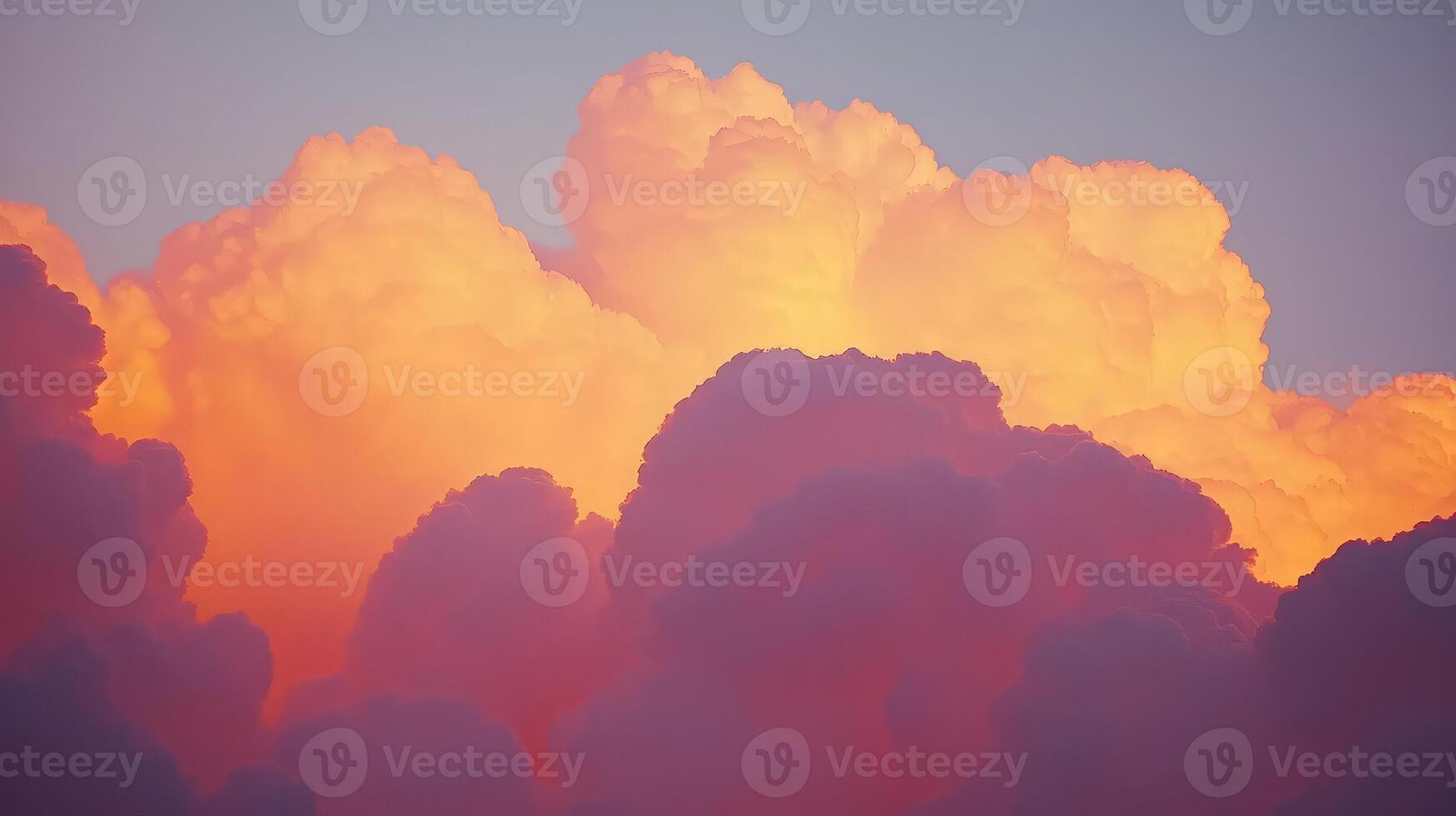 Vibrant sunset colors illuminate fluffy cumulus clouds, creating a dramatic, textured sky. photo