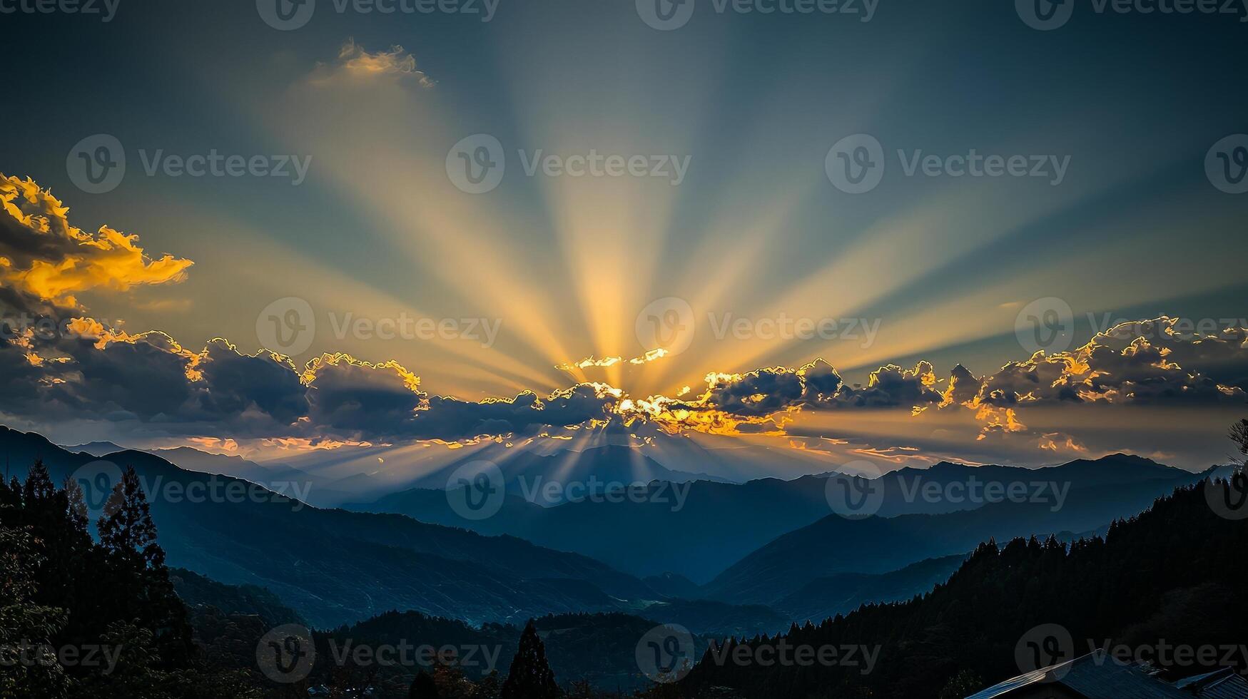 Majestic sunset bursting through clouds over mountain range. photo