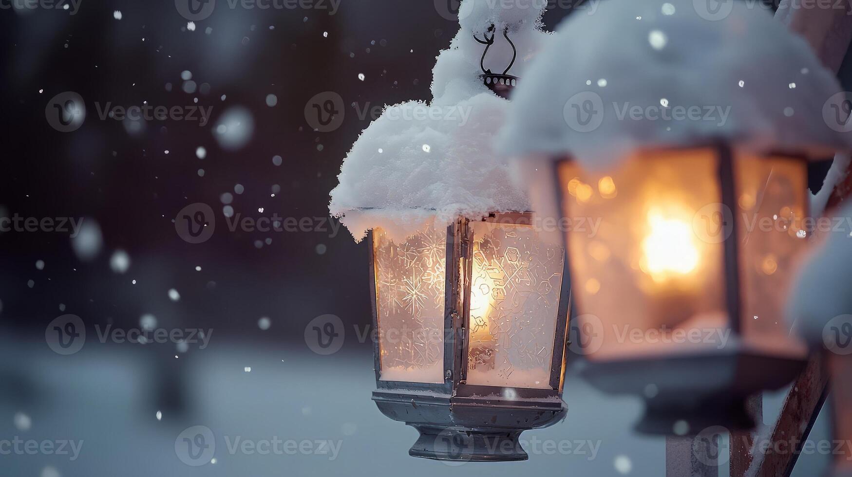 Snowy winter night scene with two illuminated lanterns. photo