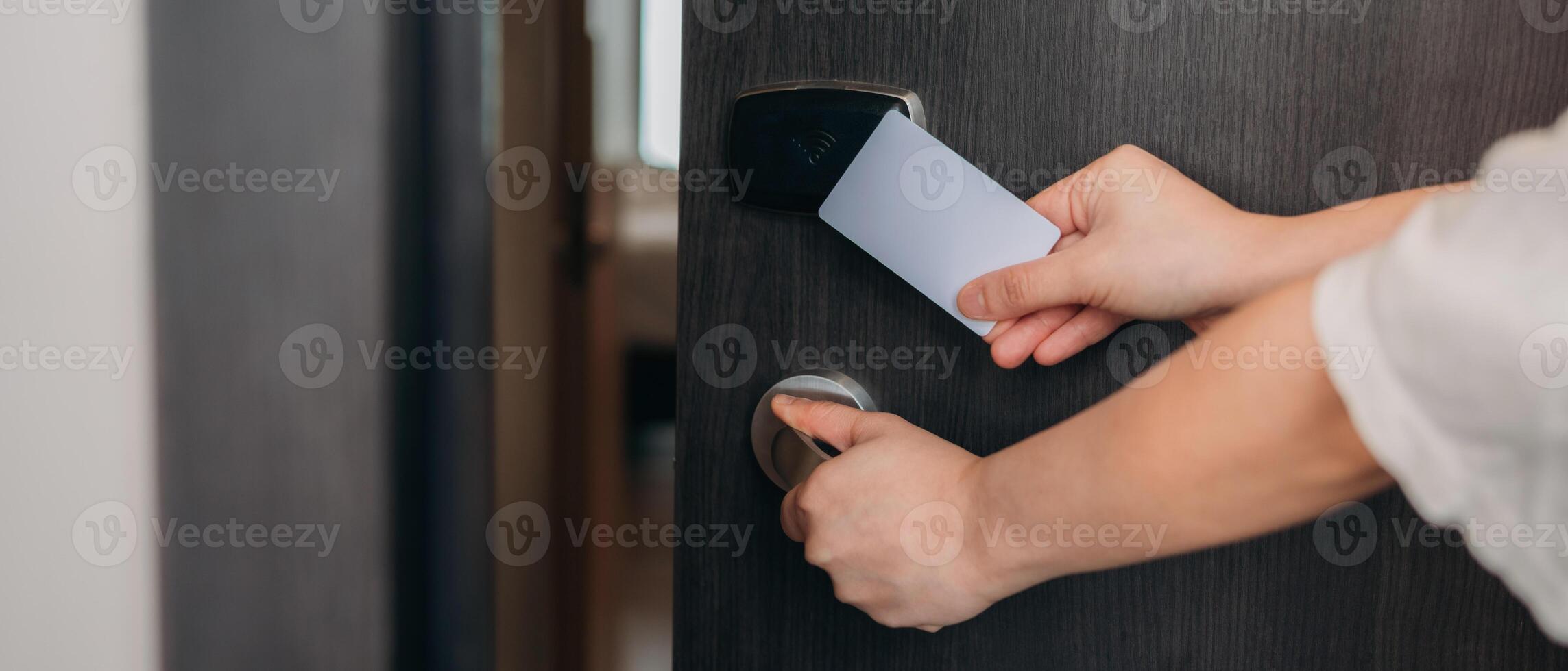 Smart card key to lock and unlock door. Security systems and protection concept. photo