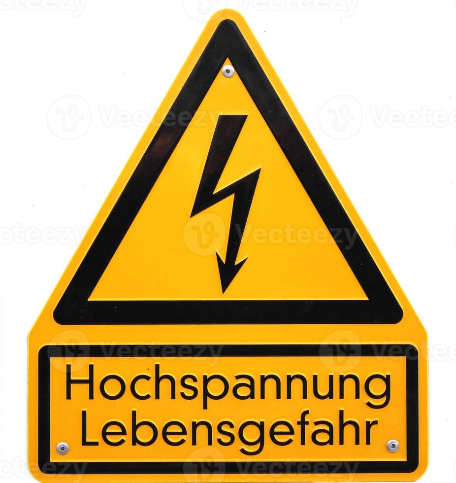High voltage sign in Germany. The lower lines mean high voltage life danger. photo