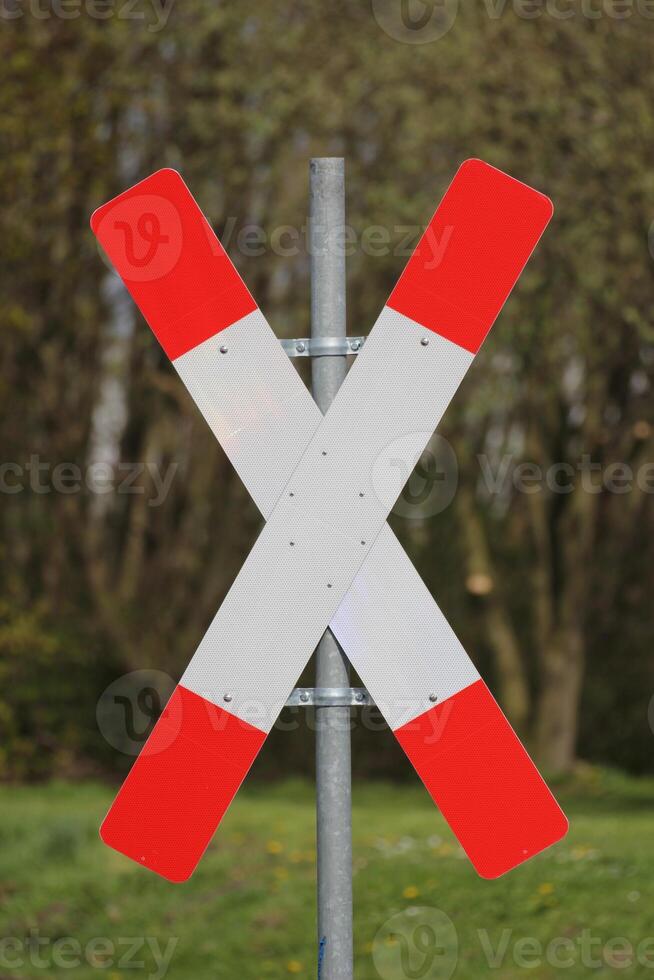 Railway crossing sign in Germany. photo