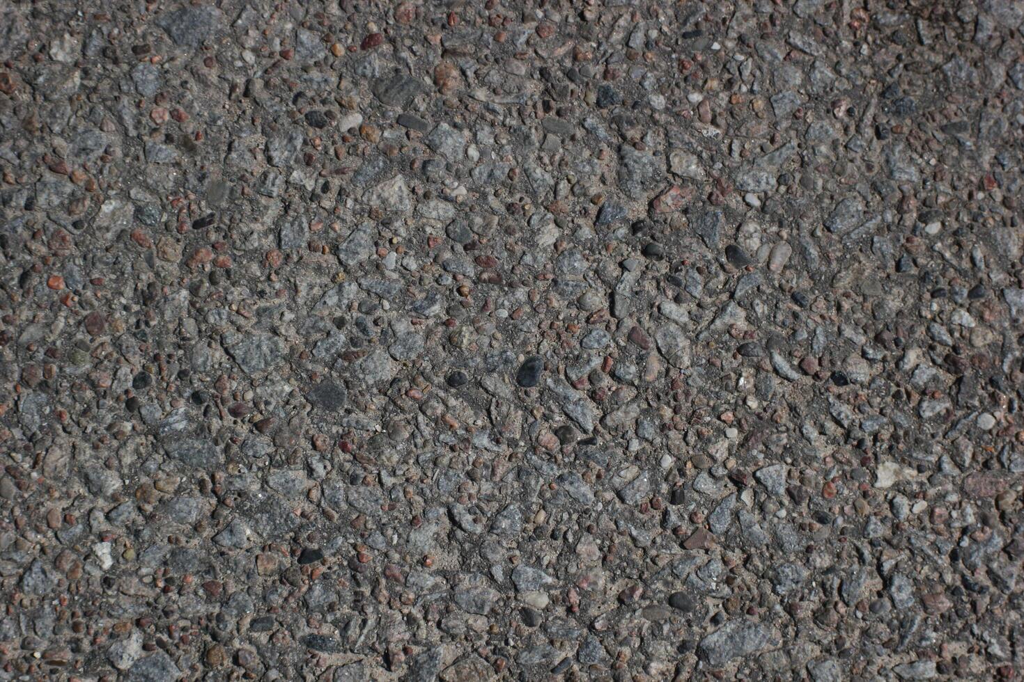 Asphalt texture from the street, dark gray. photo