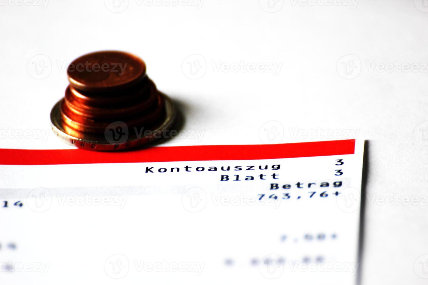 Abstract of account with several Euro coins photo