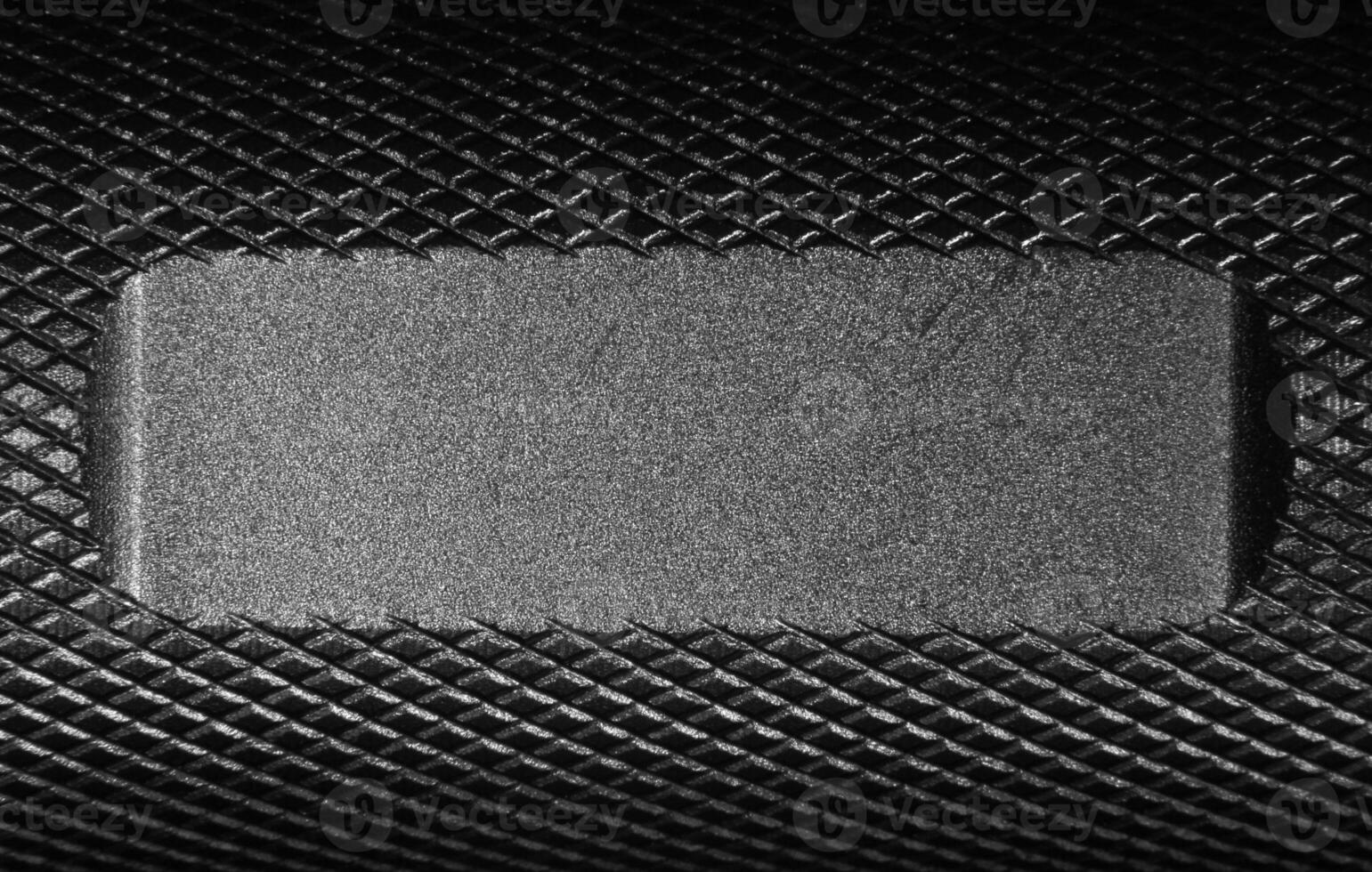 Metallic background with a flat area where a custum writing or logo can easily be applied. photo