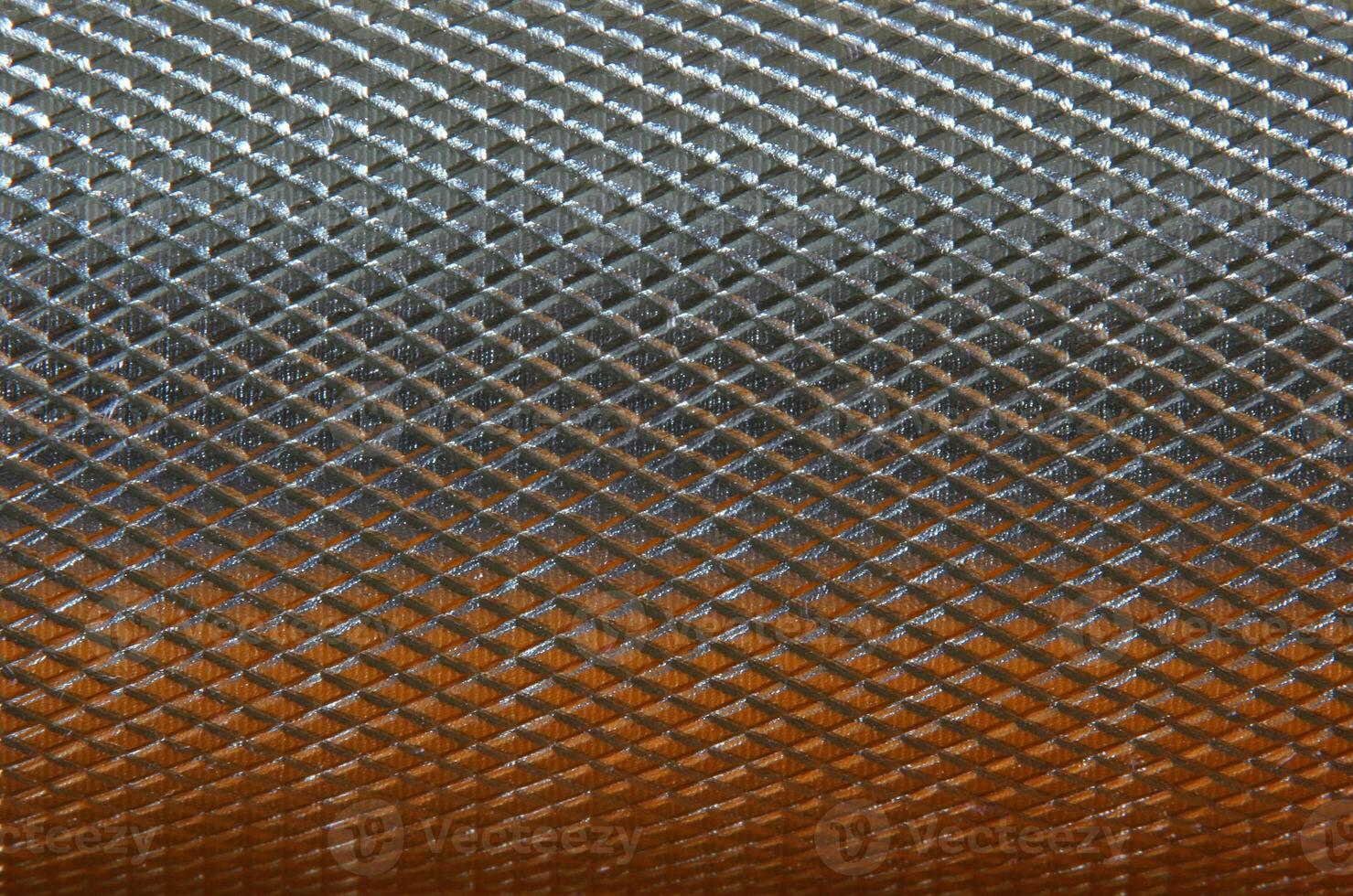 Metallic background with orange and white reflection. photo