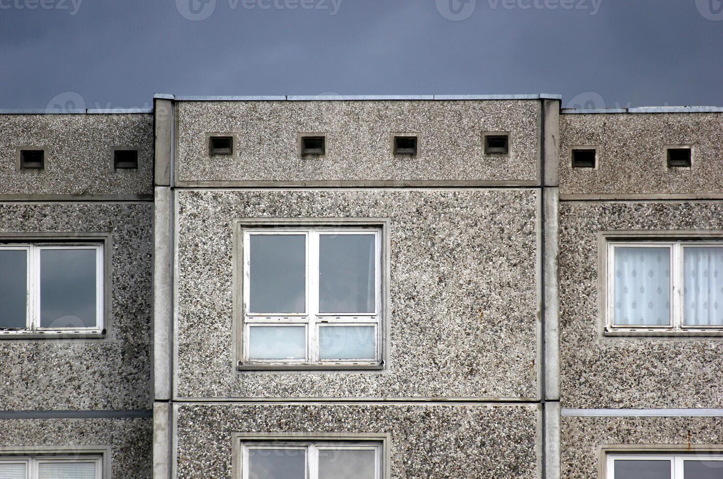 Part of a generic building reflecting the architectural style which was common in the German Democratic Republic photo