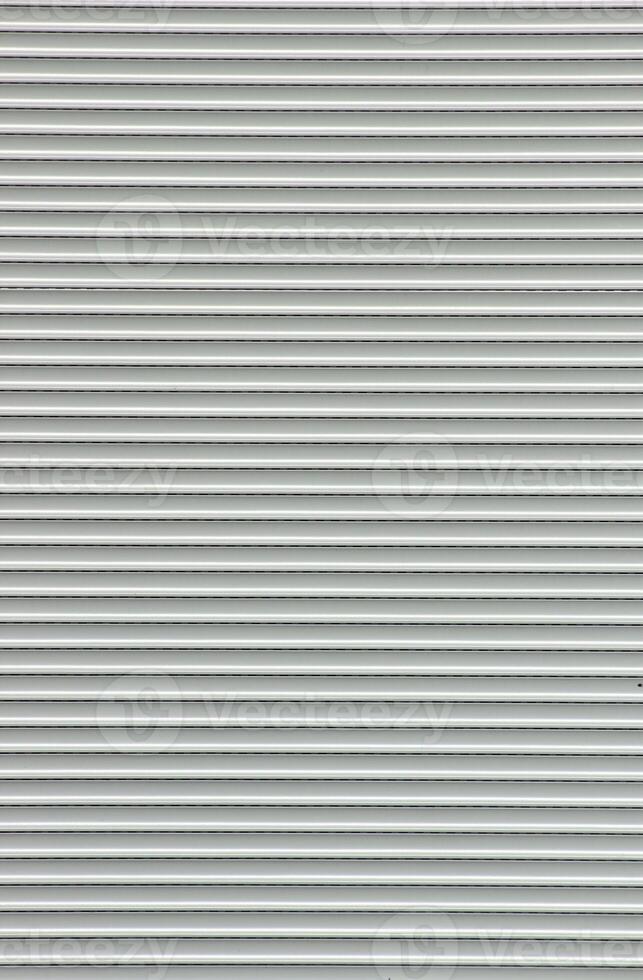 Shutterblind in front of a window. photo