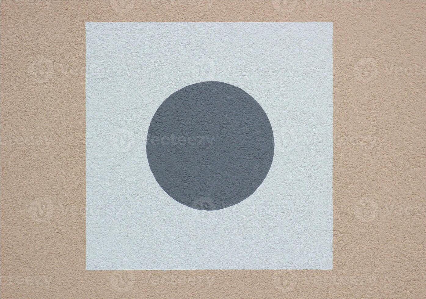 Plaster with square and circle on a house wall. photo
