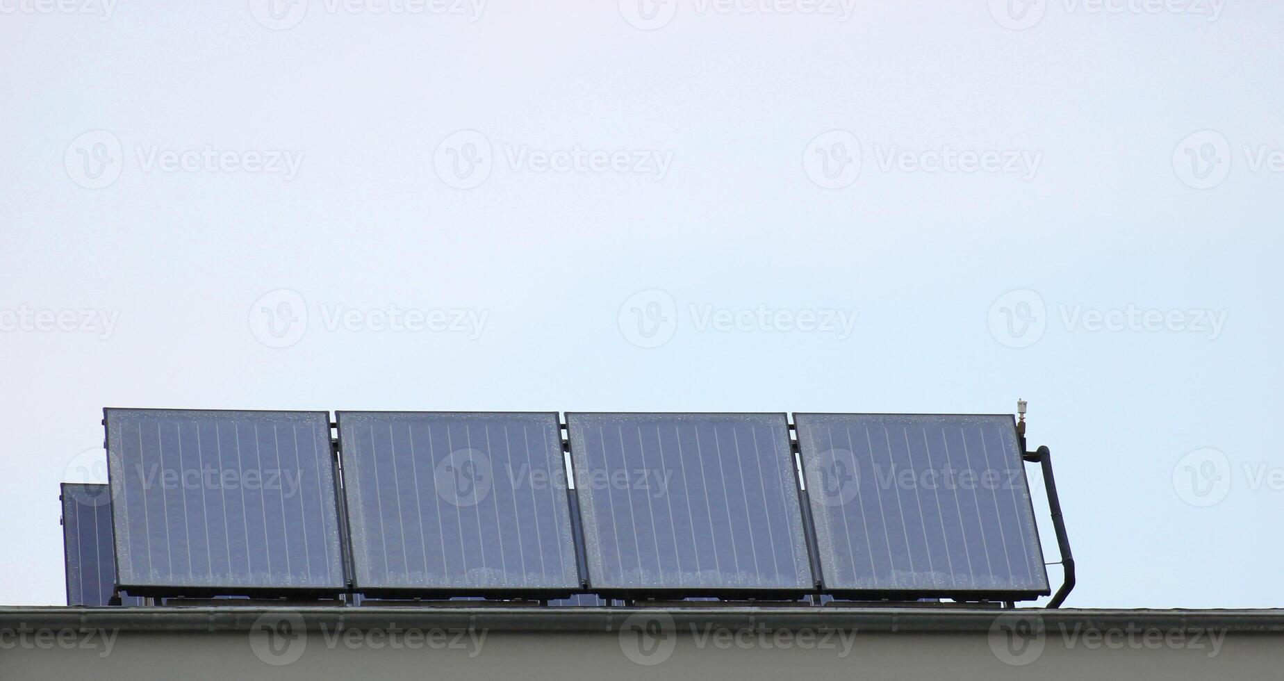 Small solar panel of roof of a building. photo