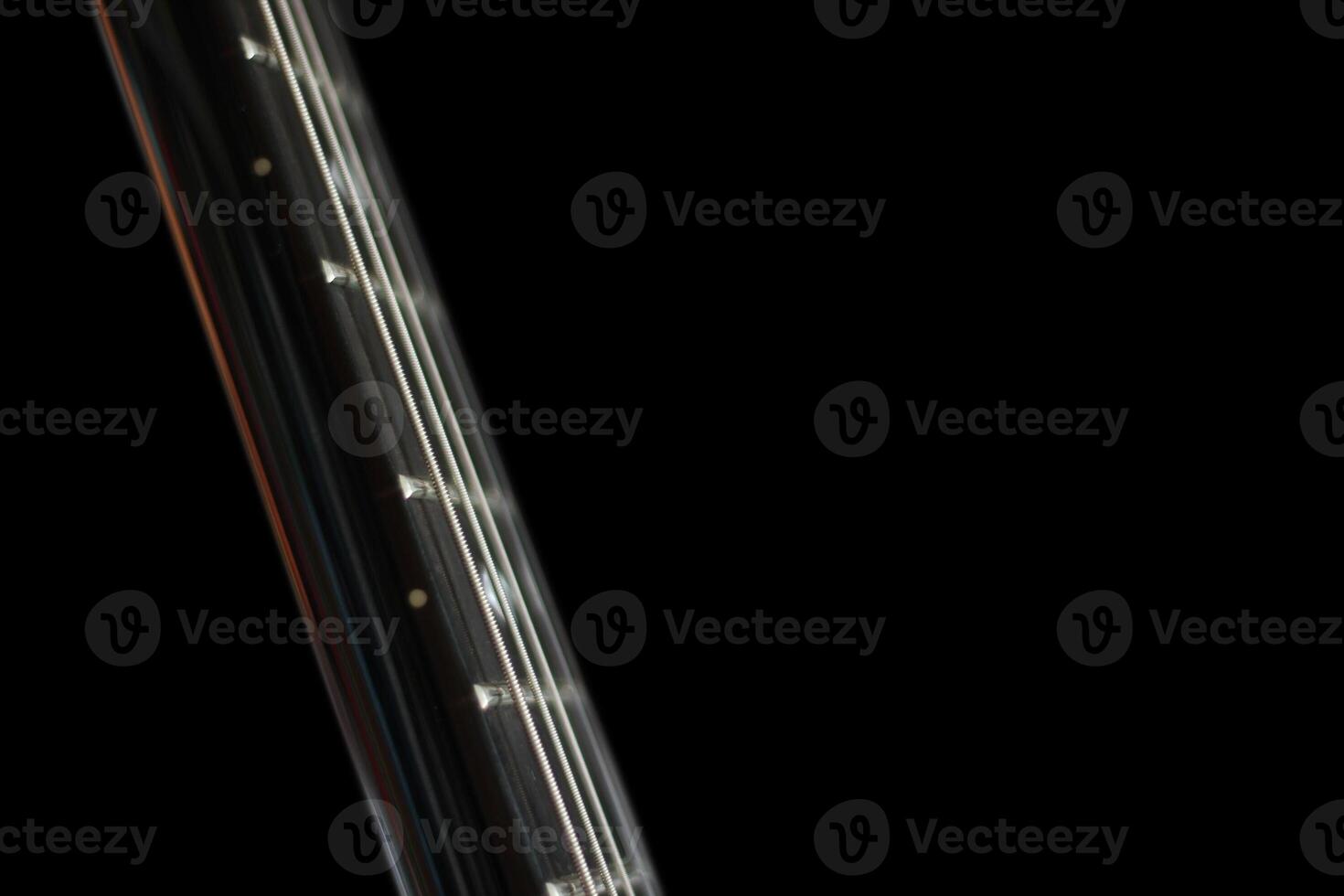Conceptual dark shot of guitar strings. photo