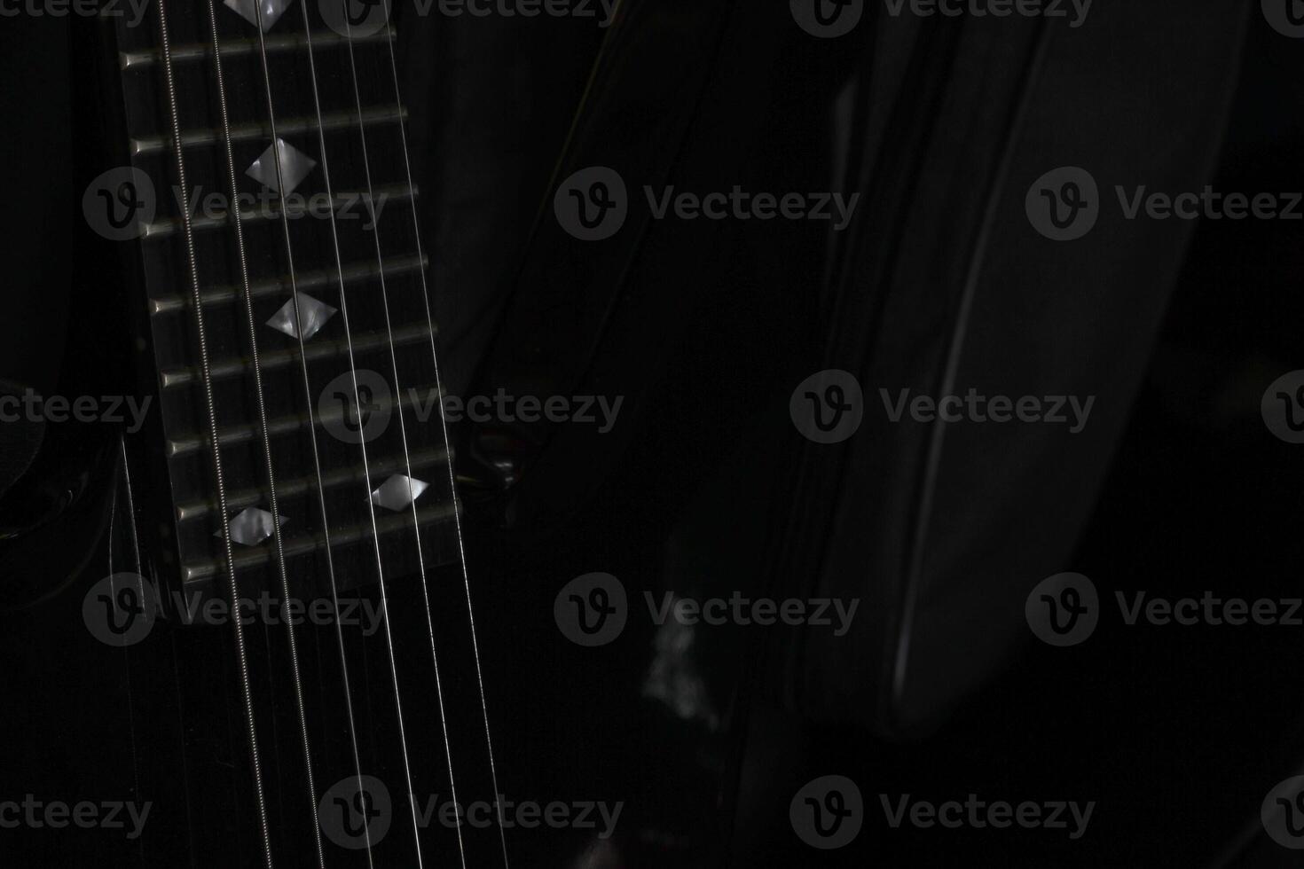 Conceptual lowkey shot of guitar strings. photo