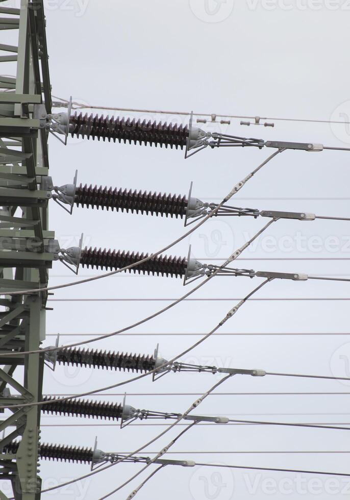 Detail view to the side of a high voltage power line in Mecklenburg-Vorpommern, Germany. photo