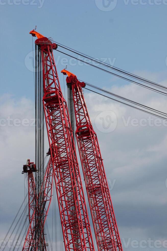 Red crane in a harbor. photo