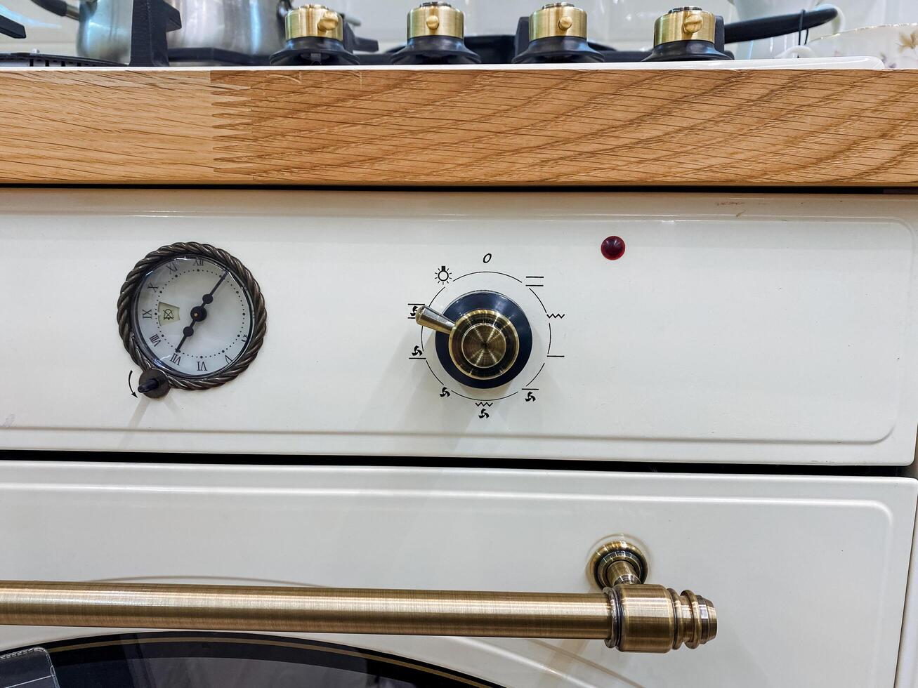 This image captures a detailed closeup view of a stove top oven featuring a clearly visible gauge that indicates its temperature and settings, perfect for culinary enthusiasts photo
