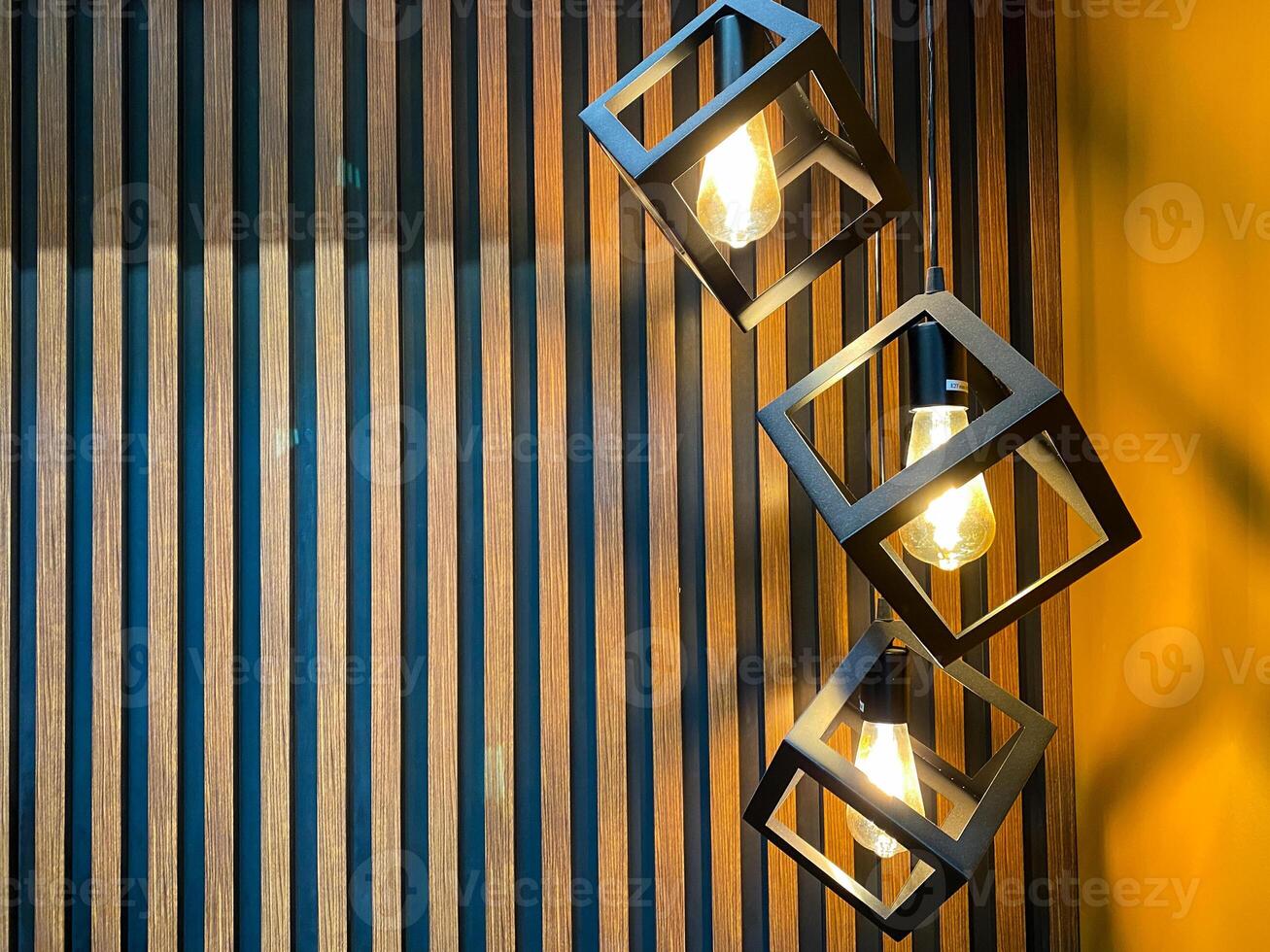 This stylish modern pendant lighting features a stunning geometric design that complements a contemporary interior setting beautifully, adding elegance and charm photo