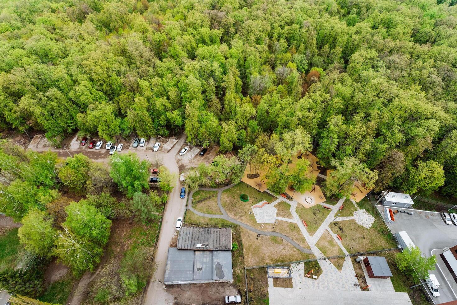Urban design with buildings and trees framing a park seen from above photo