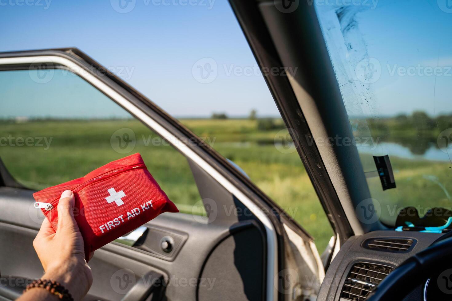 An Essential First Aid Kit for Dealing with Roadside Emergencies in a Beautiful Outdoor Scenic Setting photo