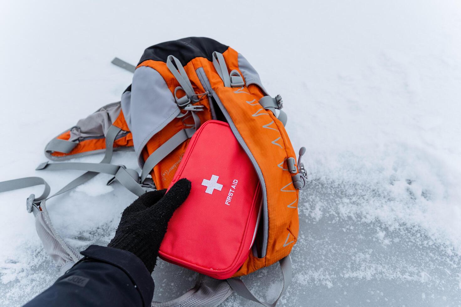 Essential First Aid Kit and Versatile Backpack for Thrilling Winter Adventures in Snowy Environments and Challenging Terrain for the Ultimate Outdoor Experience photo