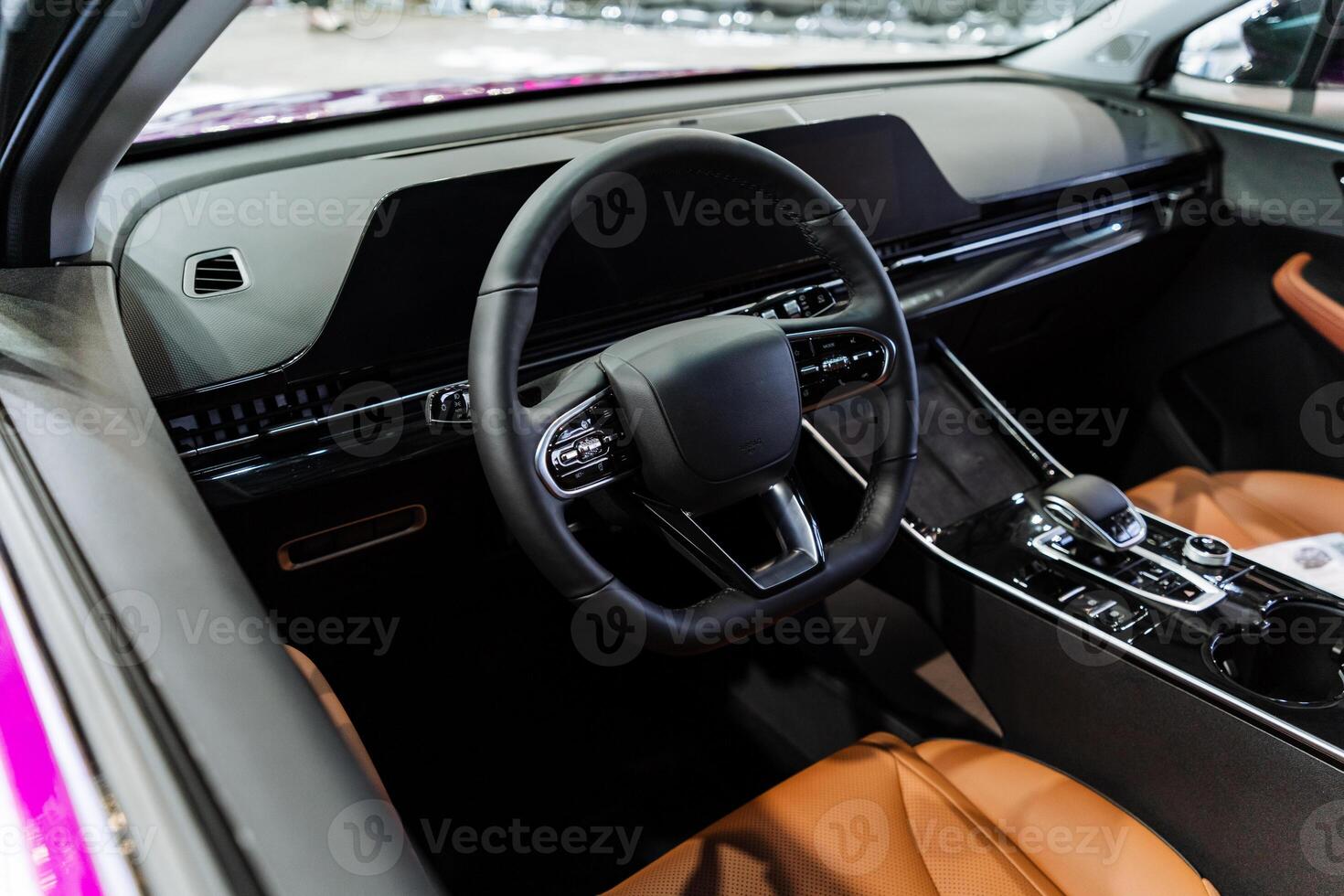 Vehicle with brown seats and steering wheel, classic car interior photo