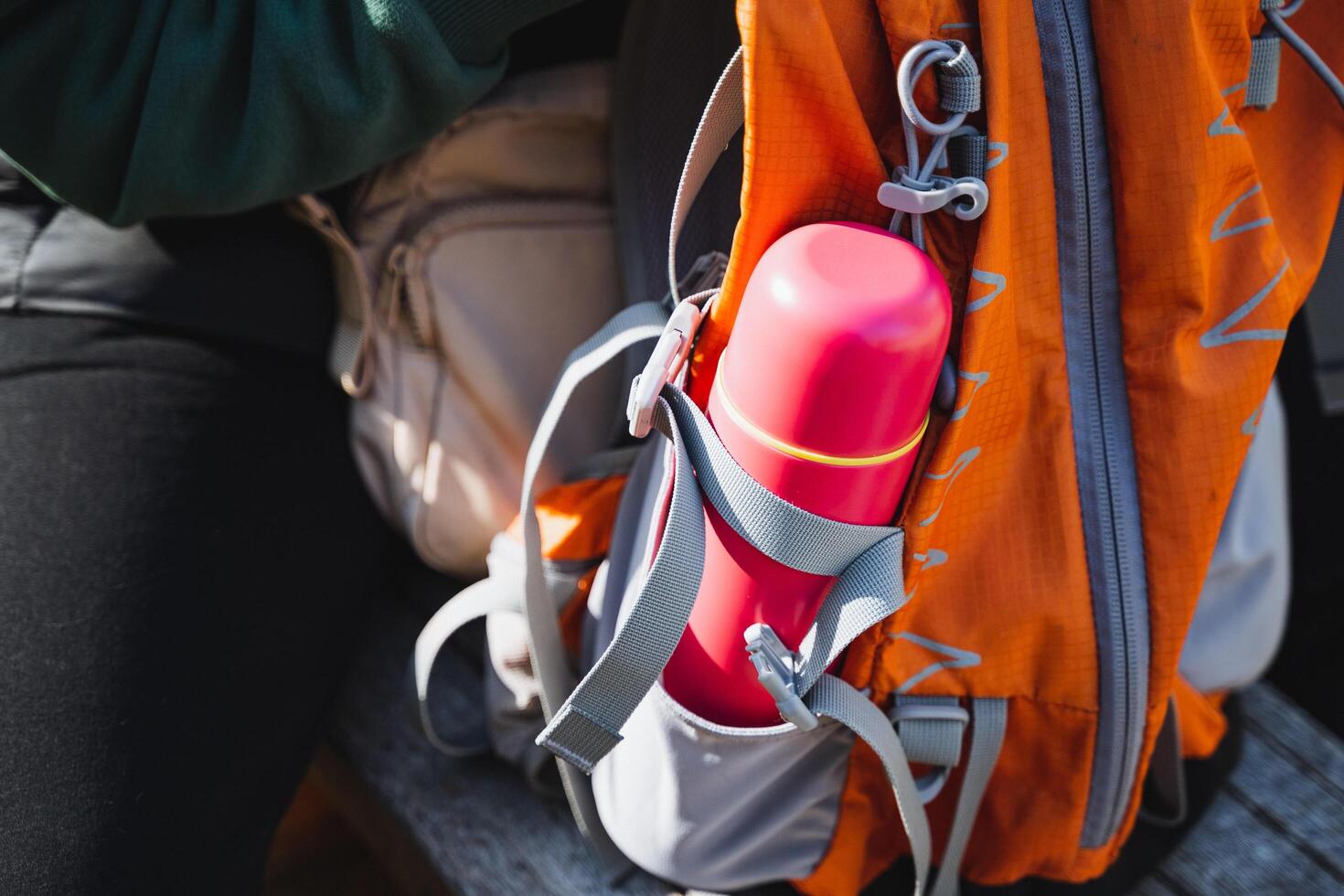 This stylish and colorful water bottle fits perfectly in your outdoor backpack, making it an ideal accessory for hiking and all your adventures photo