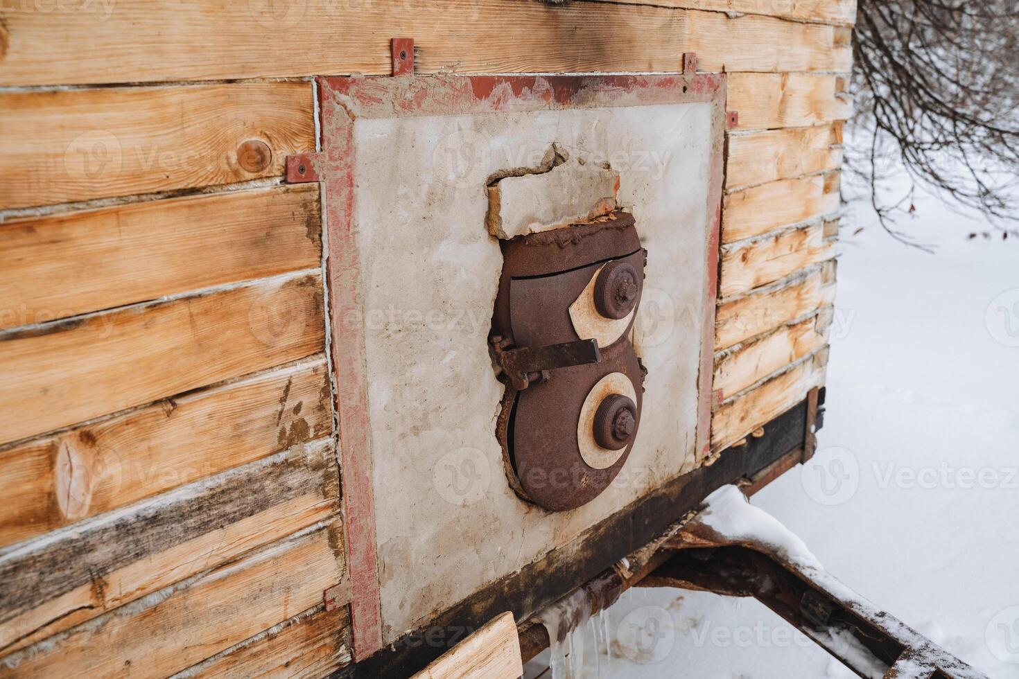 A solid wooden wall beautifully contrasts with a striking metal object, seamlessly blending the beauty of nature and exceptional craftsmanship in perfect and exquisite harmony photo
