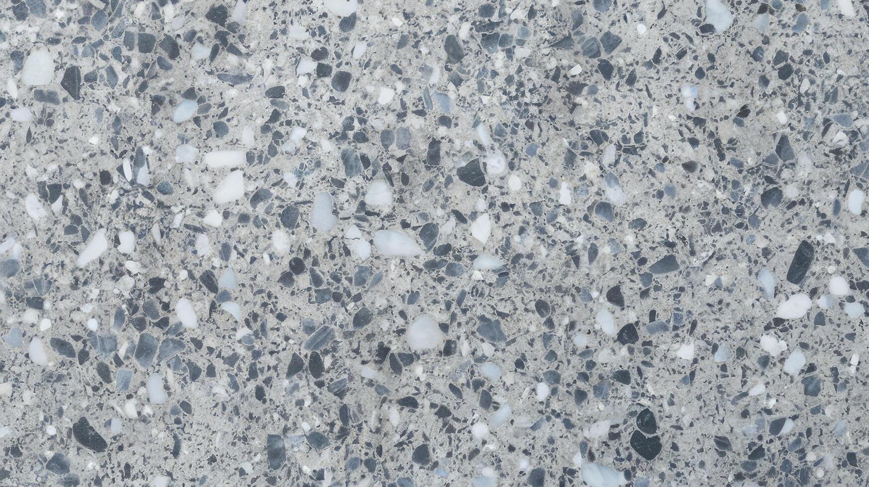 Polished Terrazzo Surface with Gray Blue and White Stone Patterns in Close Up View photo