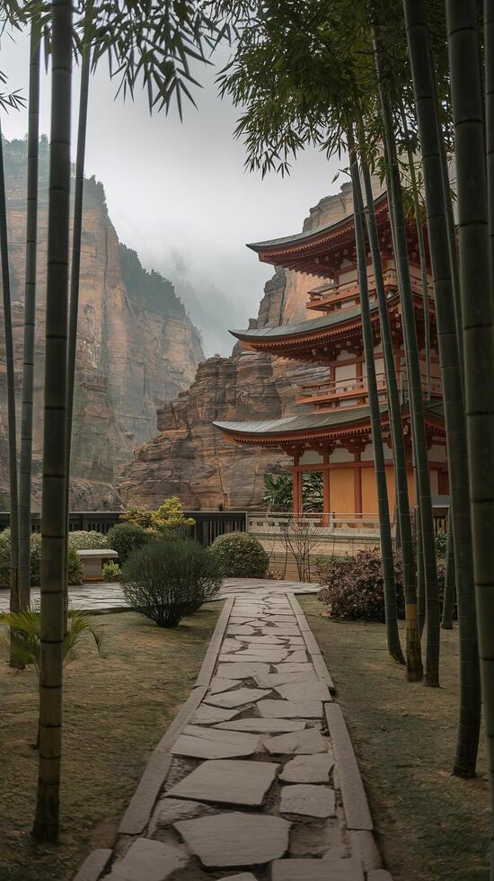 Traditional Japanese Pagoda With Bamboo Trees Stone Pathway And Mountainous Misty Background photo