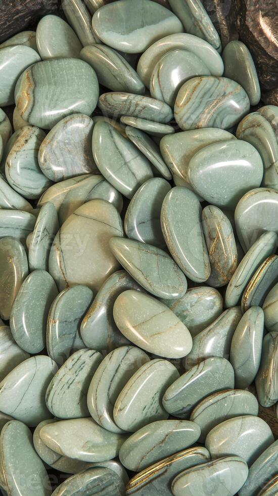 Polished Light Green Stones with Smooth Finish and Natural Patterns on Black Background for Decoration photo