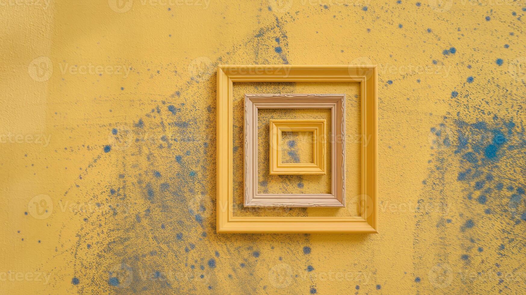 Yellow Wooden Nested Frames on Splatter Painted Wall with Blue Textured Abstract Background photo