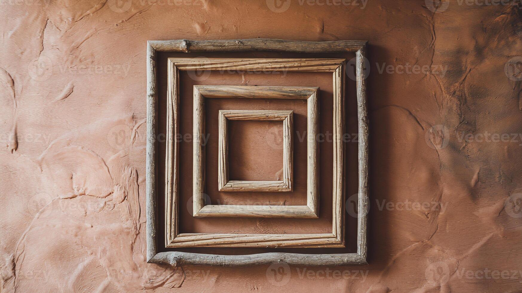 Wooden Square Frames Hanging on Textured Earthy Plaster Wall Minimal Rustic Decor Art photo