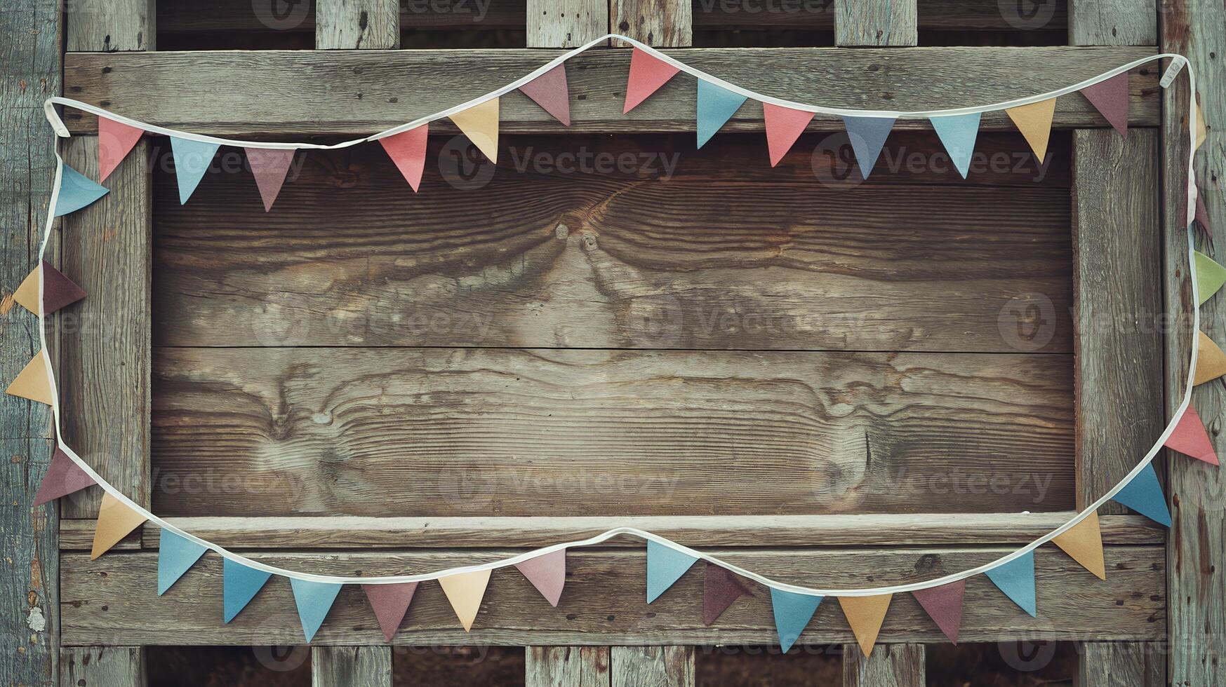 Rustic Wooden Background Framed with Multi Colored Paper Pennant Bunting Hanging on Weathered Fence photo