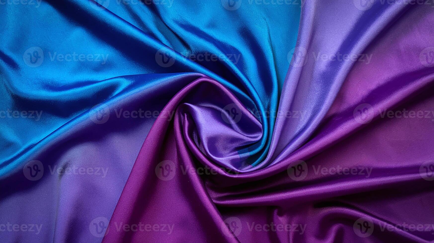 Luxurious Blue and Purple Satin Fabric with Twisted Fold Pattern for Elegant Design Background photo