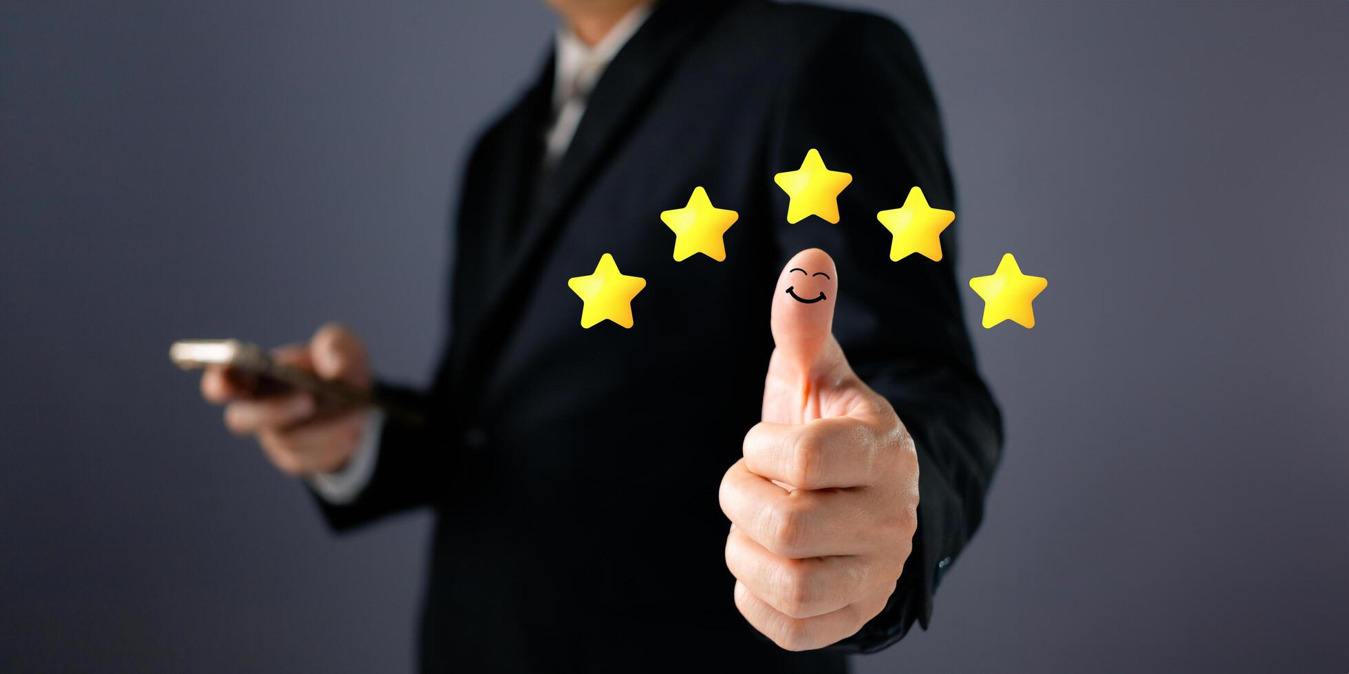 Customer service and poll concept. a businessman thumbs up on the happy smile icon and five star to give satisfaction in service.rating very impressed. photo