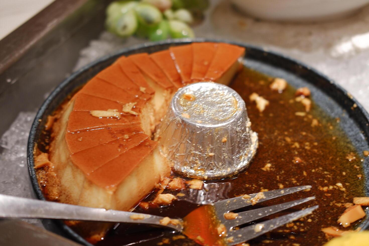 The pudding features a shiny caramel layer on top photo