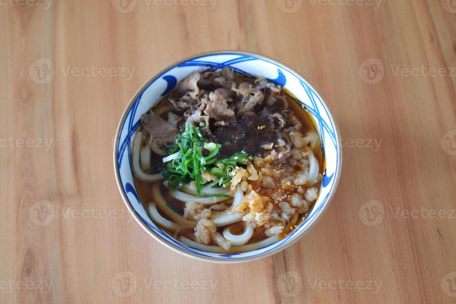 Japanese noodles with fresh meat and vegetable filling photo