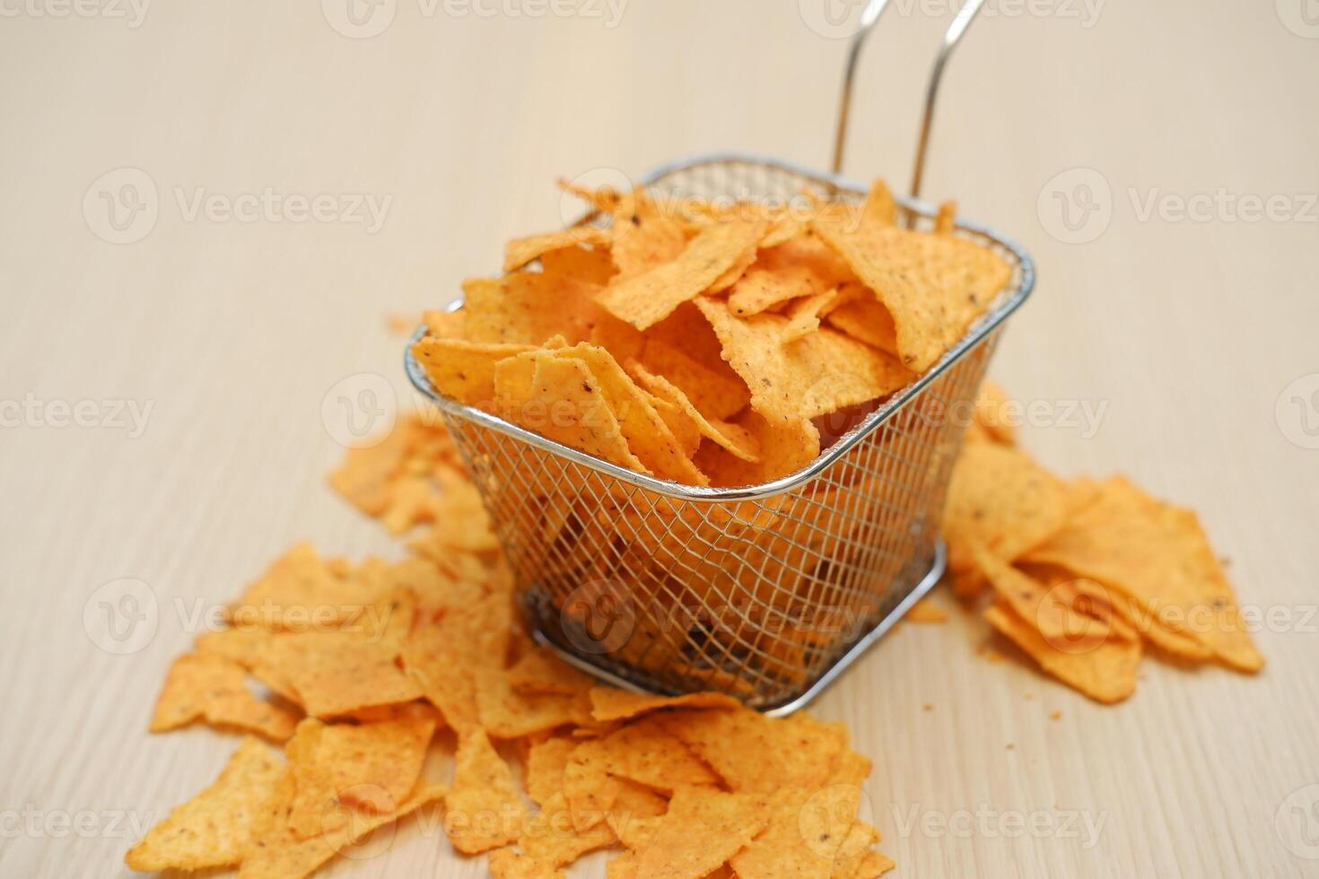 crispy tortilla chips made from corn or flour, typically seasoned with salt or spices photo