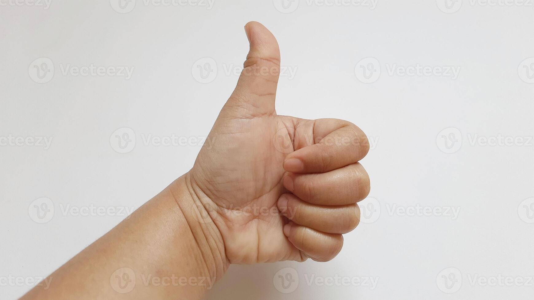 A woman thumbs up something isolated on white background photo