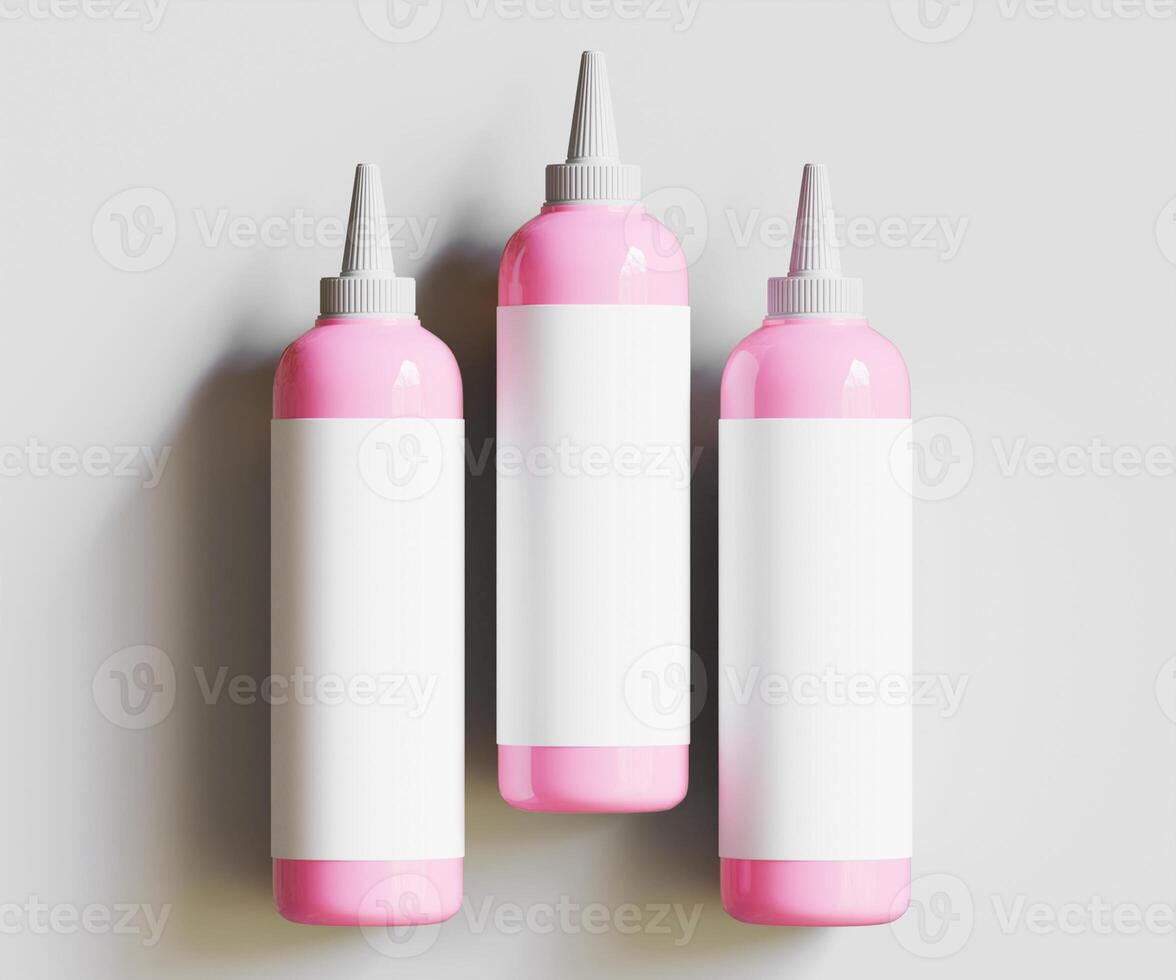 Three pink bottles with white caps on a gray background photo