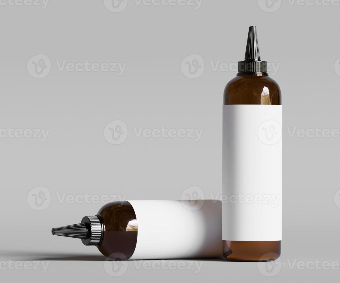 Two empty bottles of liquid on a gray background photo
