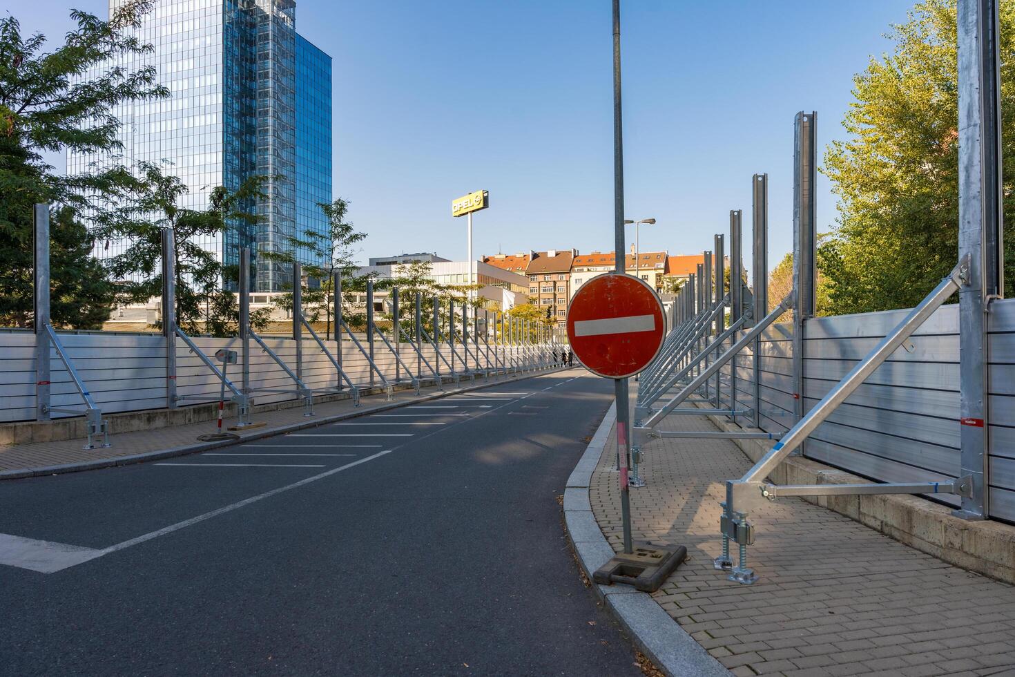 Prague, Czech Republic - September 20, 2024. Flood protection wall in Holesovice, with closed road access photo